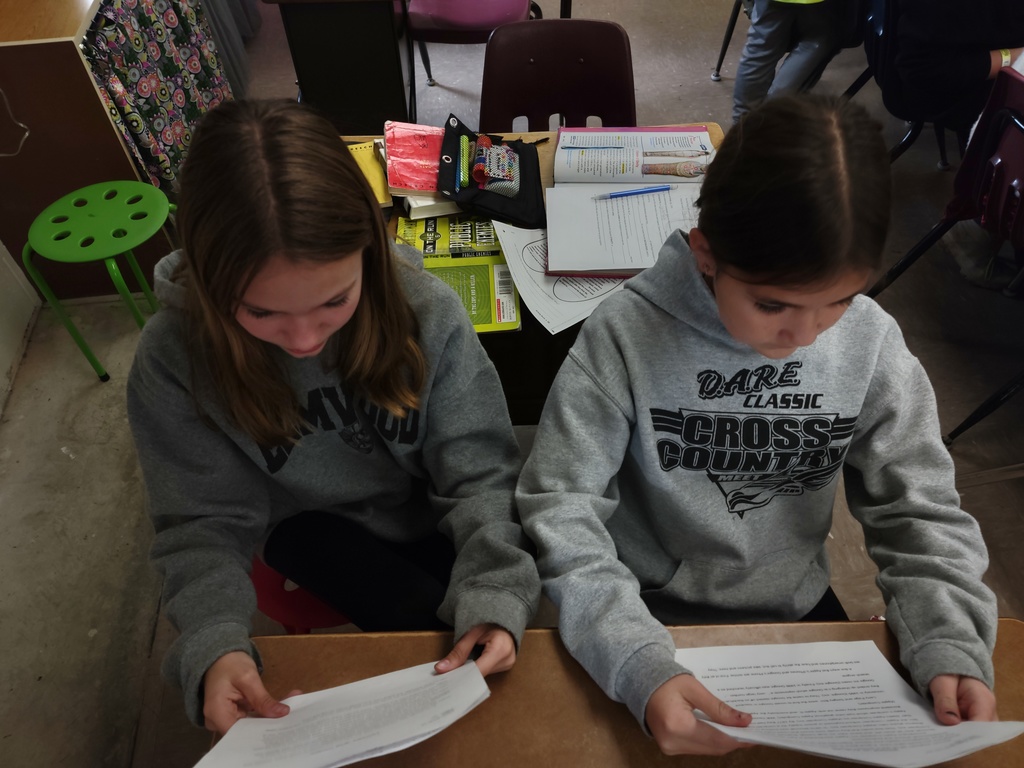 6th graders celebrating each other's Informative Writing. 